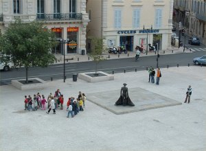 A statue of a bullfighter below